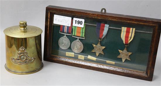 A set of WWI medals and a Trench Art pot